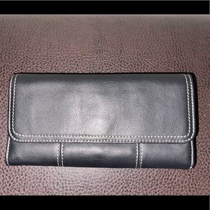 Clark’s black leather wallet